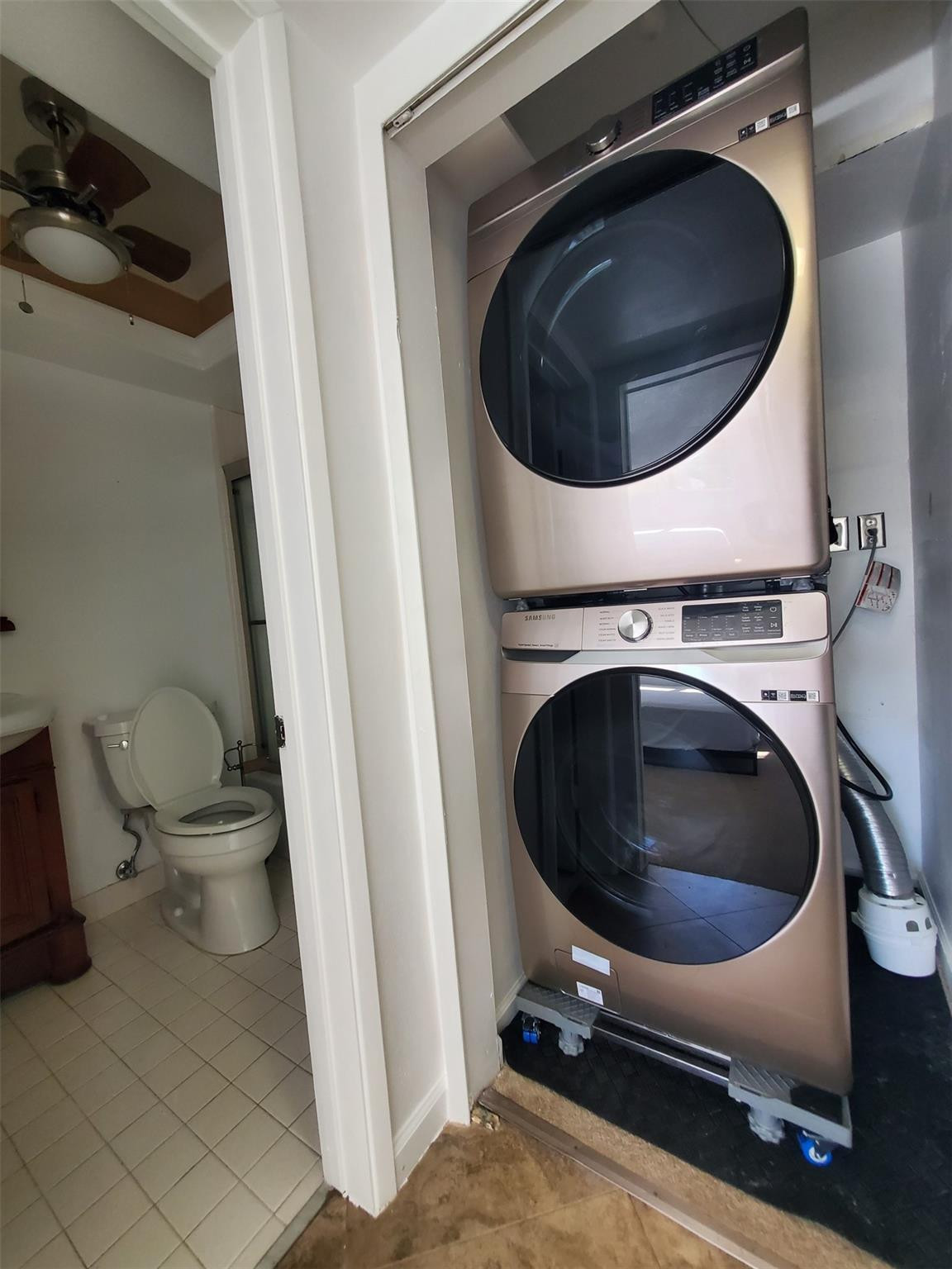 651 Pine Drive, Unit 305 Pompano Beach, FL 33060 - Photo 8 of 15 a utility room with dryer and washer