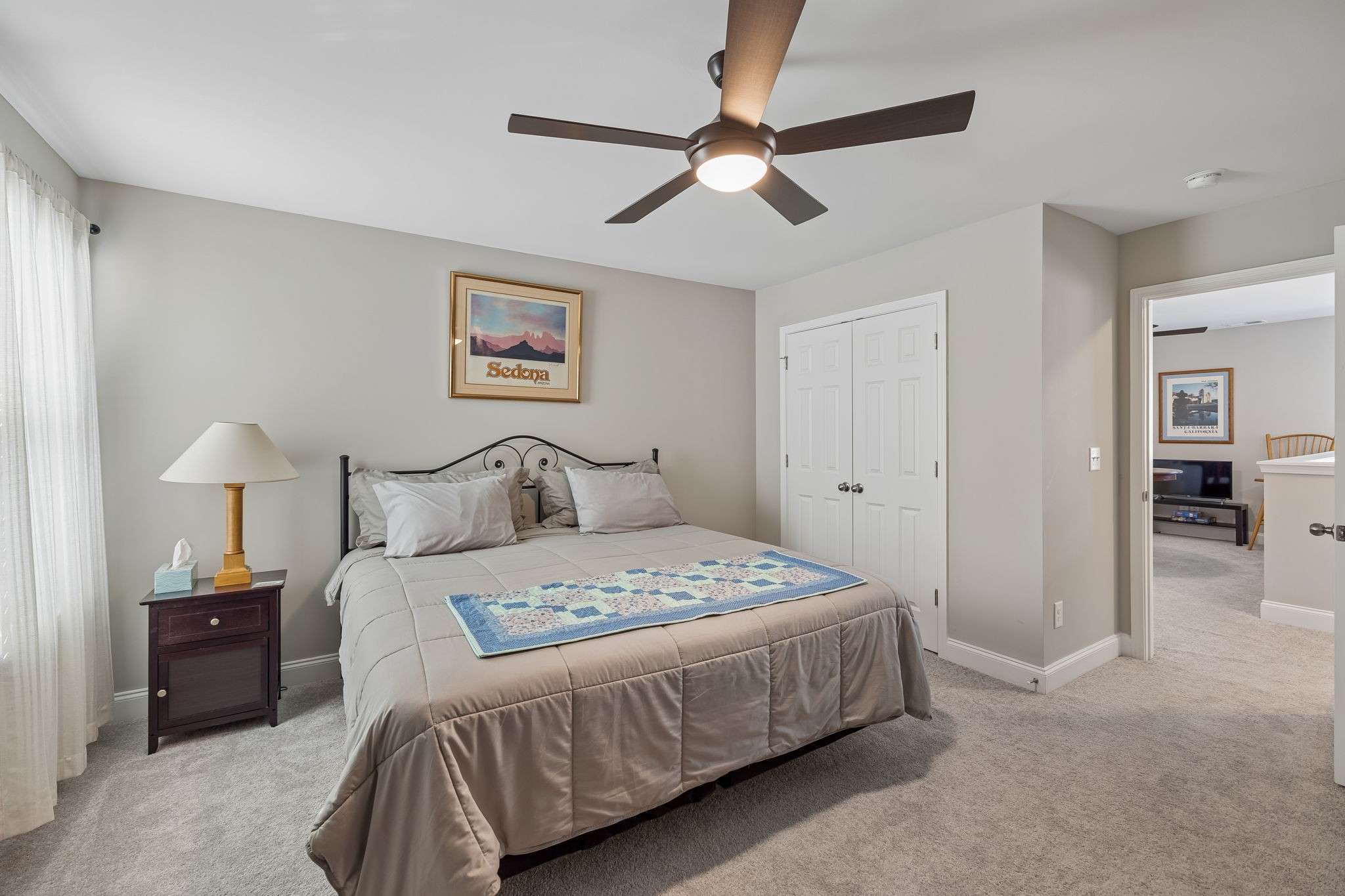 1017 Violet Street Spring Hill, TN 37174 - Photo 25 of 36 a bedroom with a bed and a painting on the wall