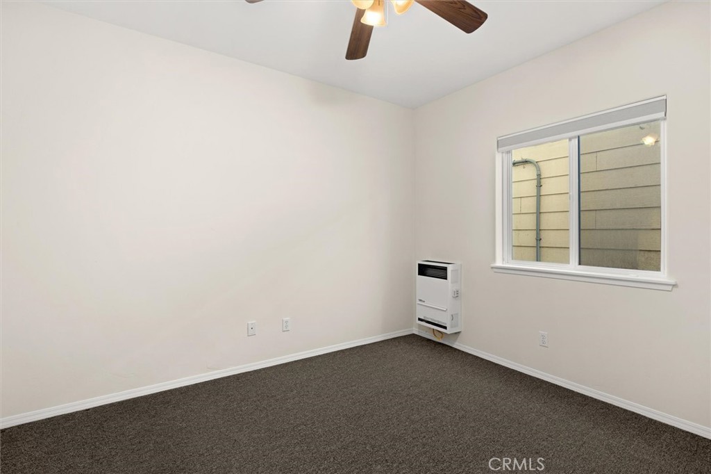 1187 Main Street Morro Bay, CA 93442 - Photo 25 of 33 an empty room with a window