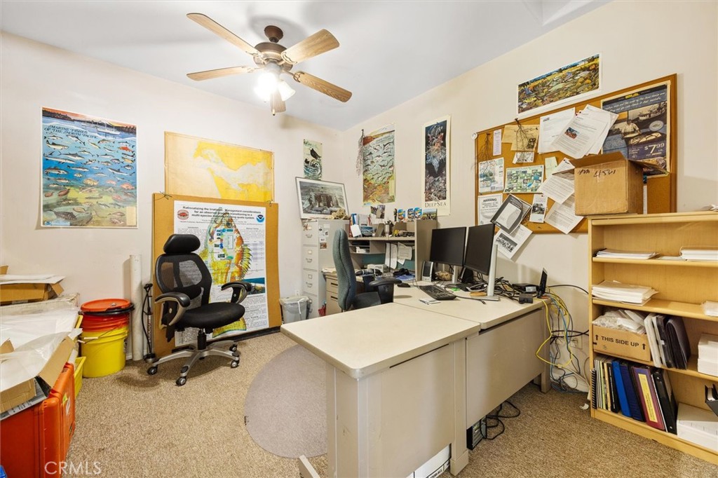1187 Main Street Morro Bay, CA 93442 - Photo 31 of 33 a view of a workspace with furniture and a window