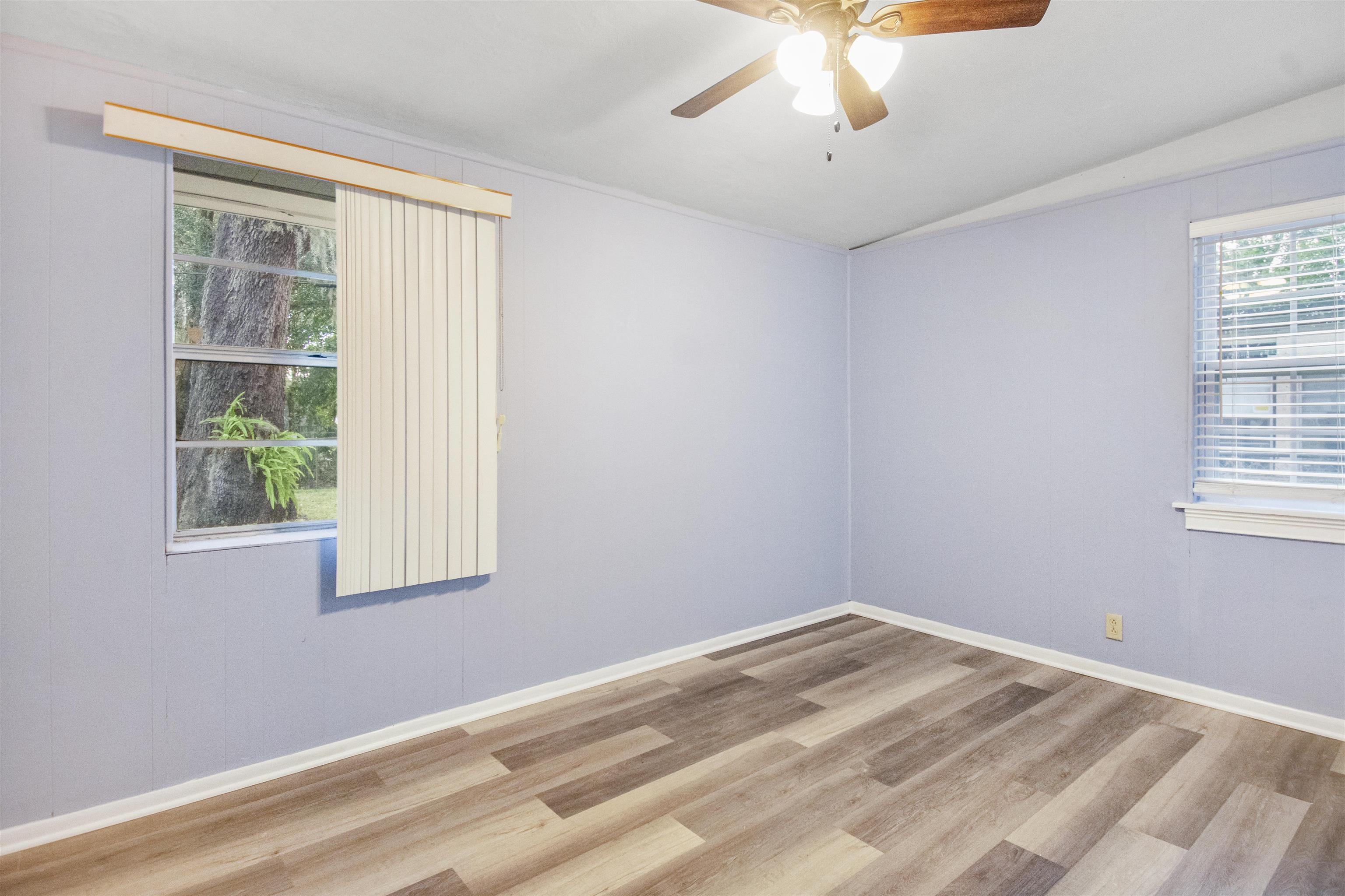 100 Spring Street St. Augustine, FL 32084 - Photo 19 of 21 a view of a room with a window and a ceiling fan
