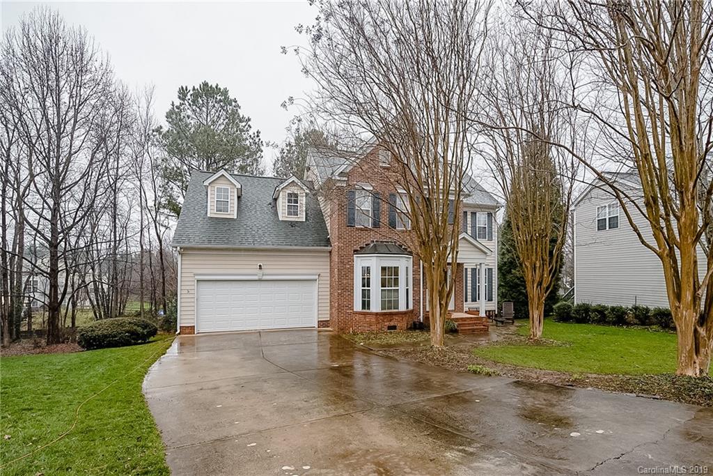 144 Comata Road Mooresville, NC 28117 - Photo 2 of 35 a front view of a house with a yard