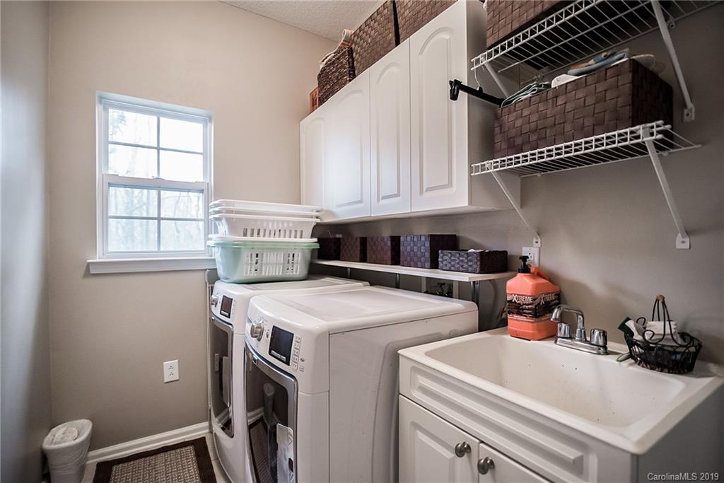 144 Comata Road Mooresville, NC 28117 - Photo 30 of 35 a utility room with dryer and washer