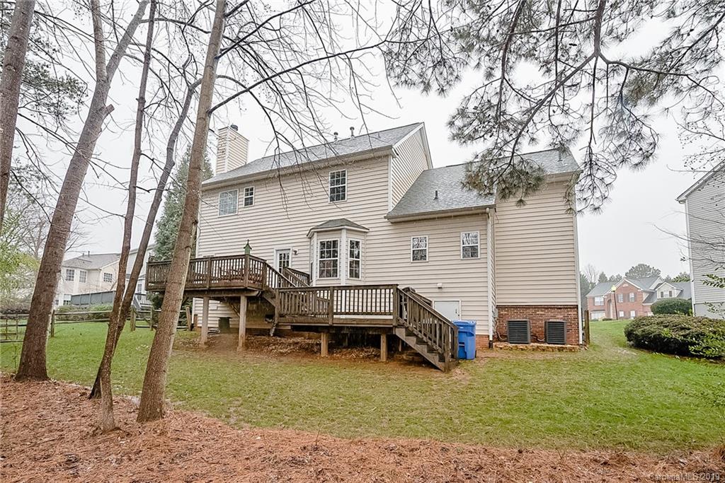 144 Comata Road Mooresville, NC 28117 - Photo 33 of 35 a view of a house with a yard