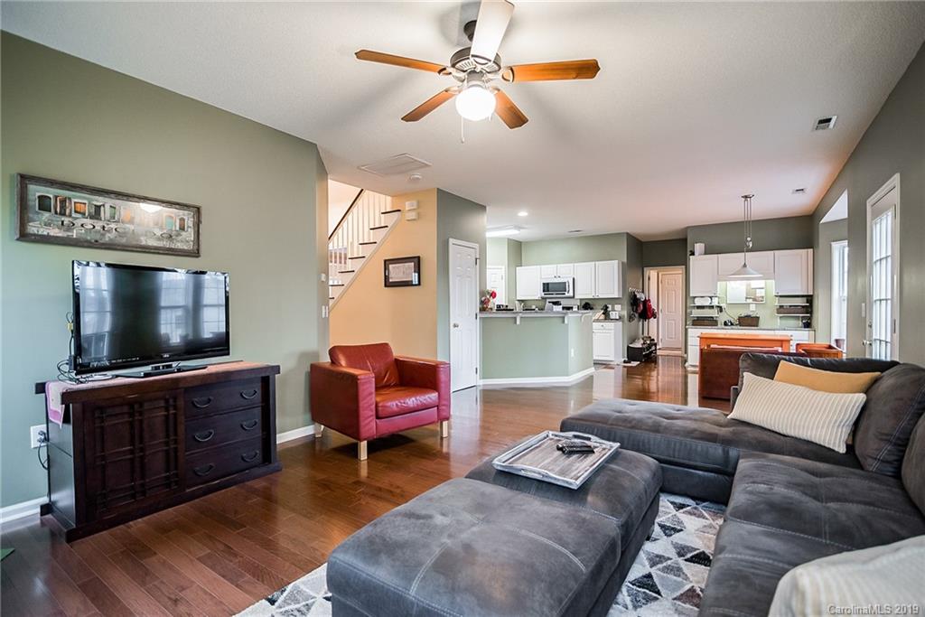 144 Comata Road Mooresville, NC 28117 - Photo 9 of 35 a living room with furniture and a flat screen tv