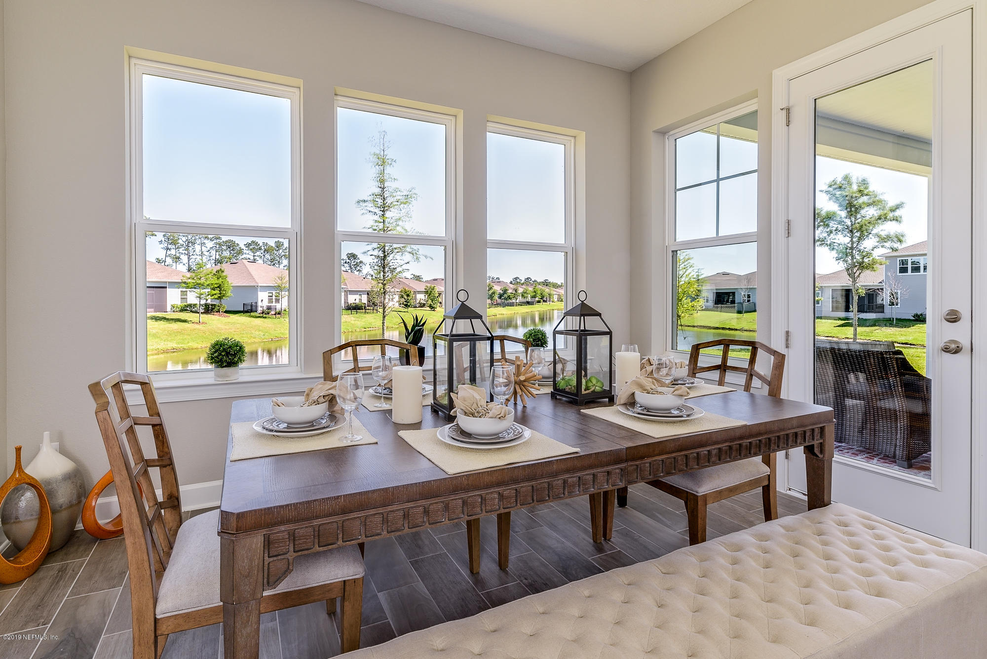 71 Lansing Court St. Augustine, FL 32092 - Photo 25 of 49 a view of a dining room with furniture window and outside view