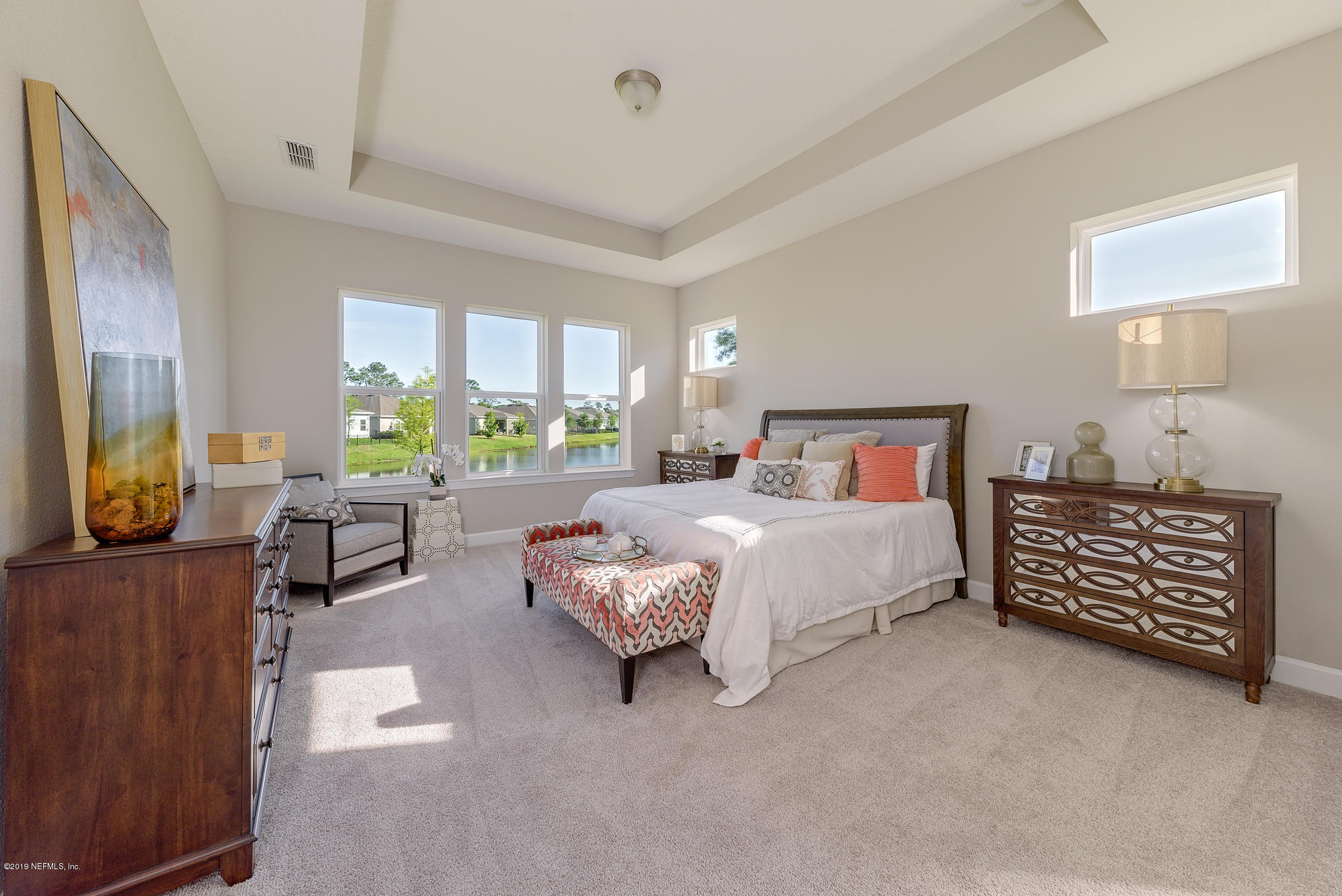 71 Lansing Court St. Augustine, FL 32092 - Photo 30 of 49 a bed room with a bed and a couch