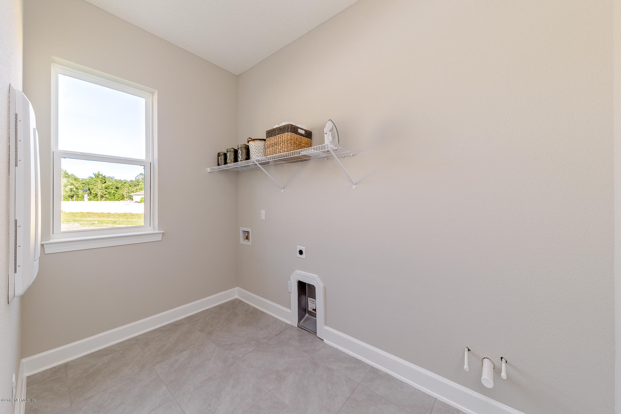 71 Lansing Court St. Augustine, FL 32092 - Photo 36 of 49 an empty room with a window