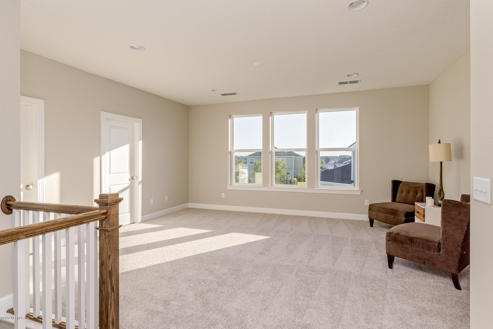 71 Lansing Court St. Augustine, FL 32092 - Photo 39 of 49 a living room with furniture and a large window