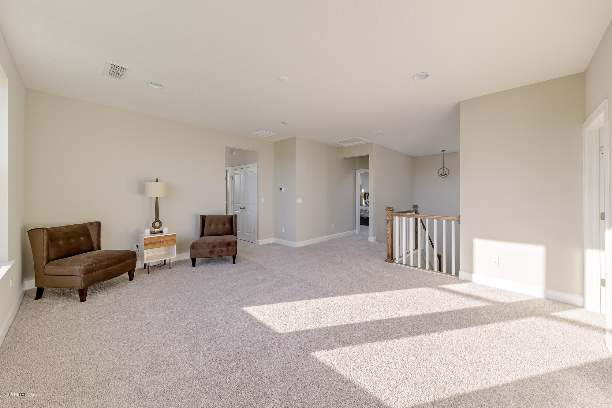 71 Lansing Court St. Augustine, FL 32092 - Photo 40 of 49 a bedroom with furniture and a couch