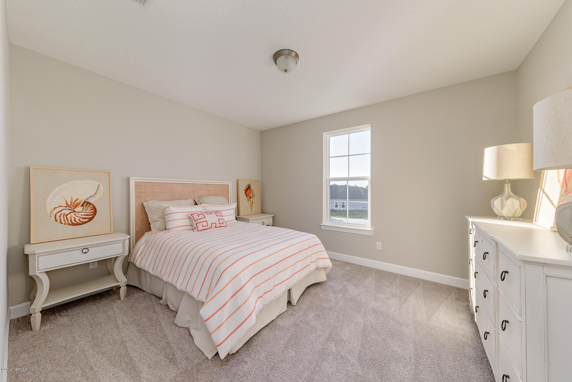 71 Lansing Court St. Augustine, FL 32092 - Photo 41 of 49 a bedroom with a bed and a window