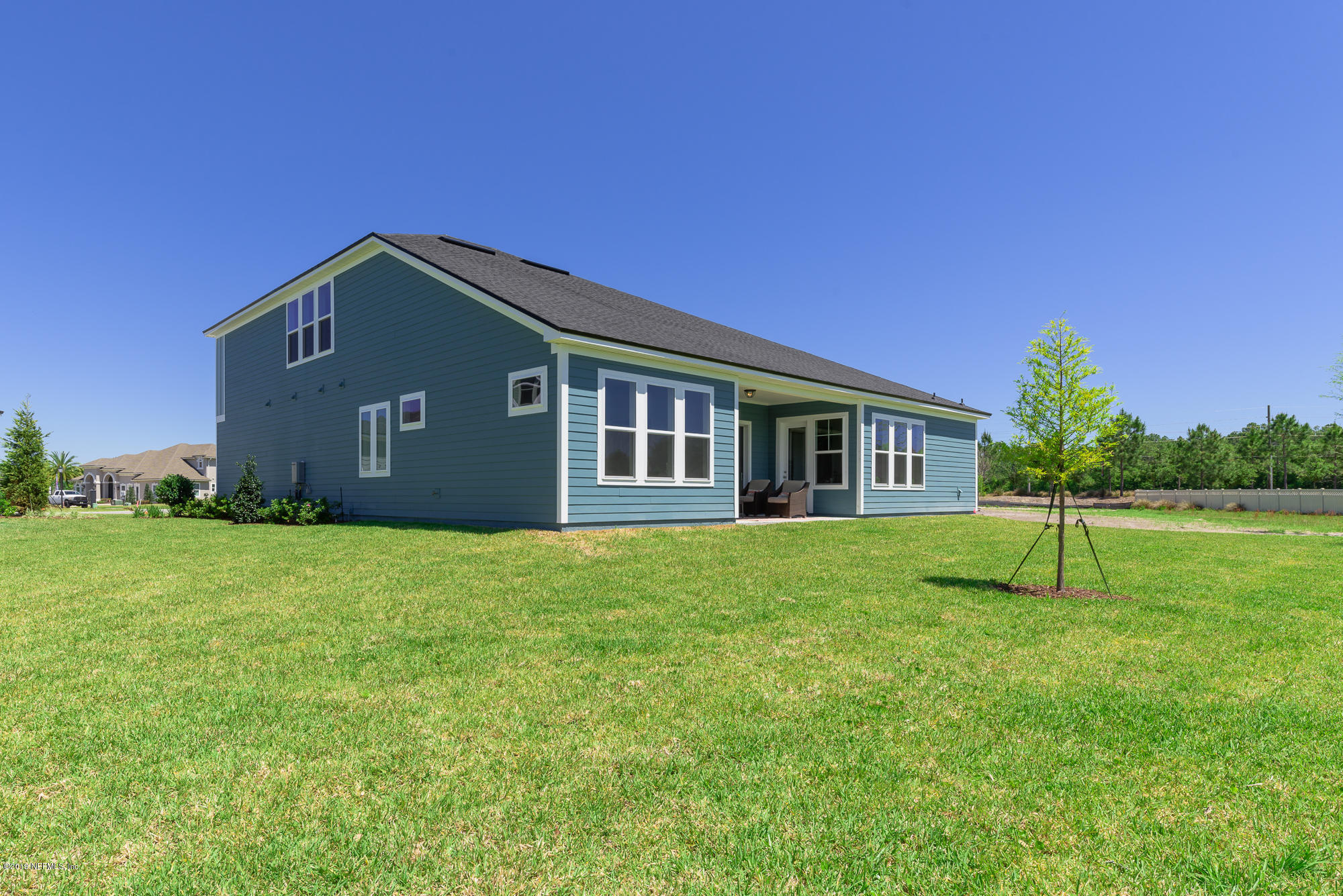 71 Lansing Court St. Augustine, FL 32092 - Photo 47 of 49 a house view with a garden space