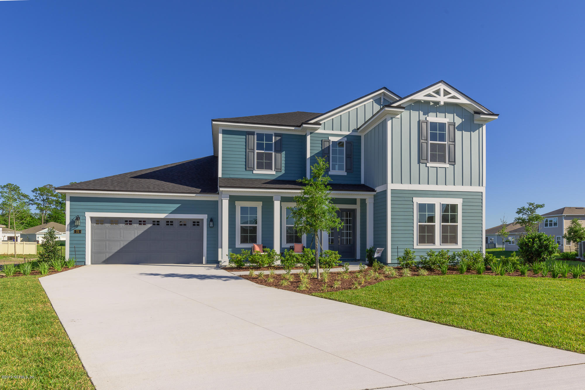 71 Lansing Court St. Augustine, FL 32092 - Photo 49 of 49 front view of a house with a yard