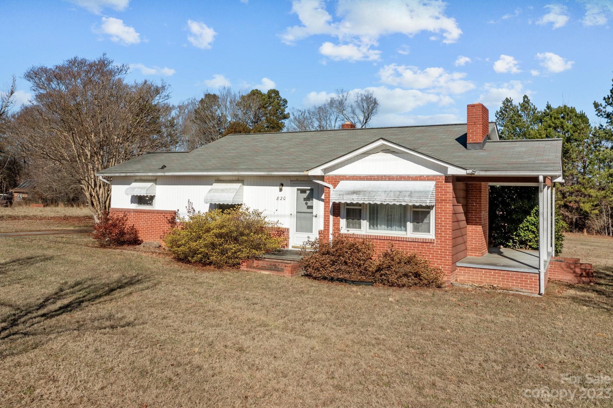 820 Thompson Road Salisbury, NC 28147 - Photo 2 of 48 a front view of a house with a yard