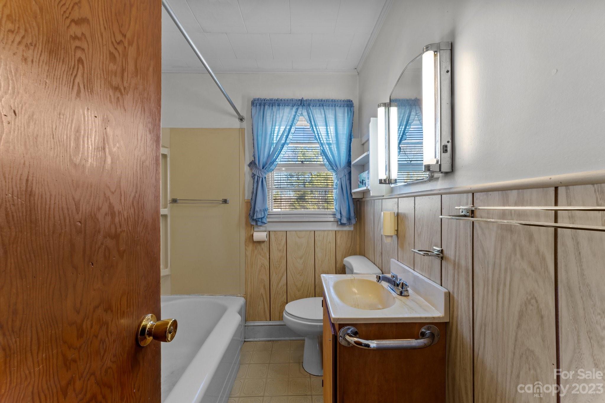 820 Thompson Road Salisbury, NC 28147 - Photo 24 of 48 a bathroom with a sink a toilet and shower