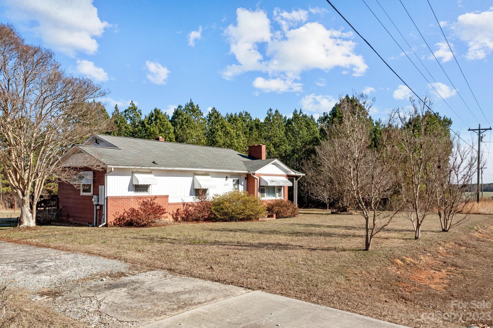 820 Thompson Road Salisbury, NC 28147 - Photo 31 of 48 a front view of a house with a yard