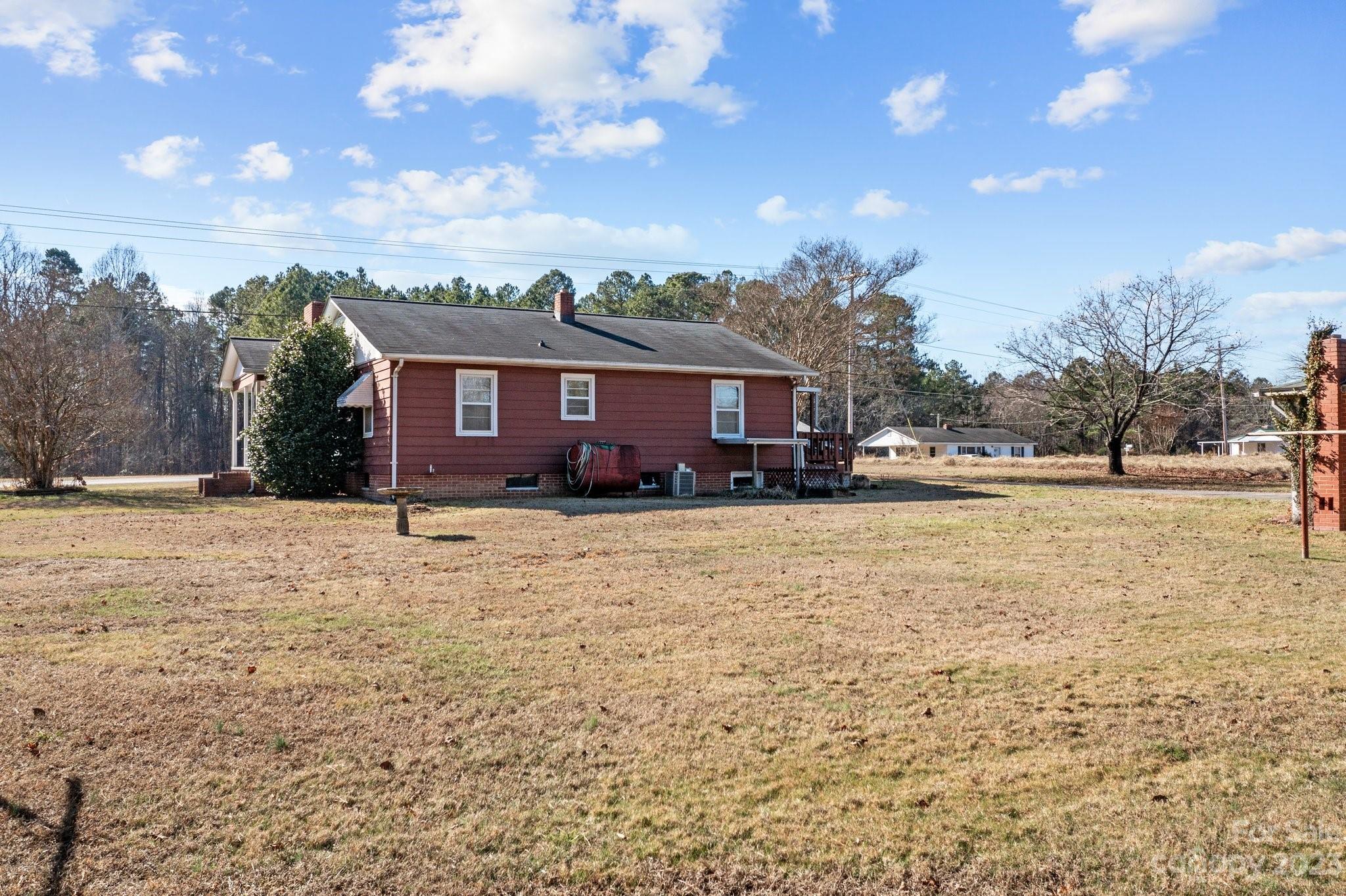 820 Thompson Road Salisbury, NC 28147 - Photo 36 of 48 a front view of a house with a yard