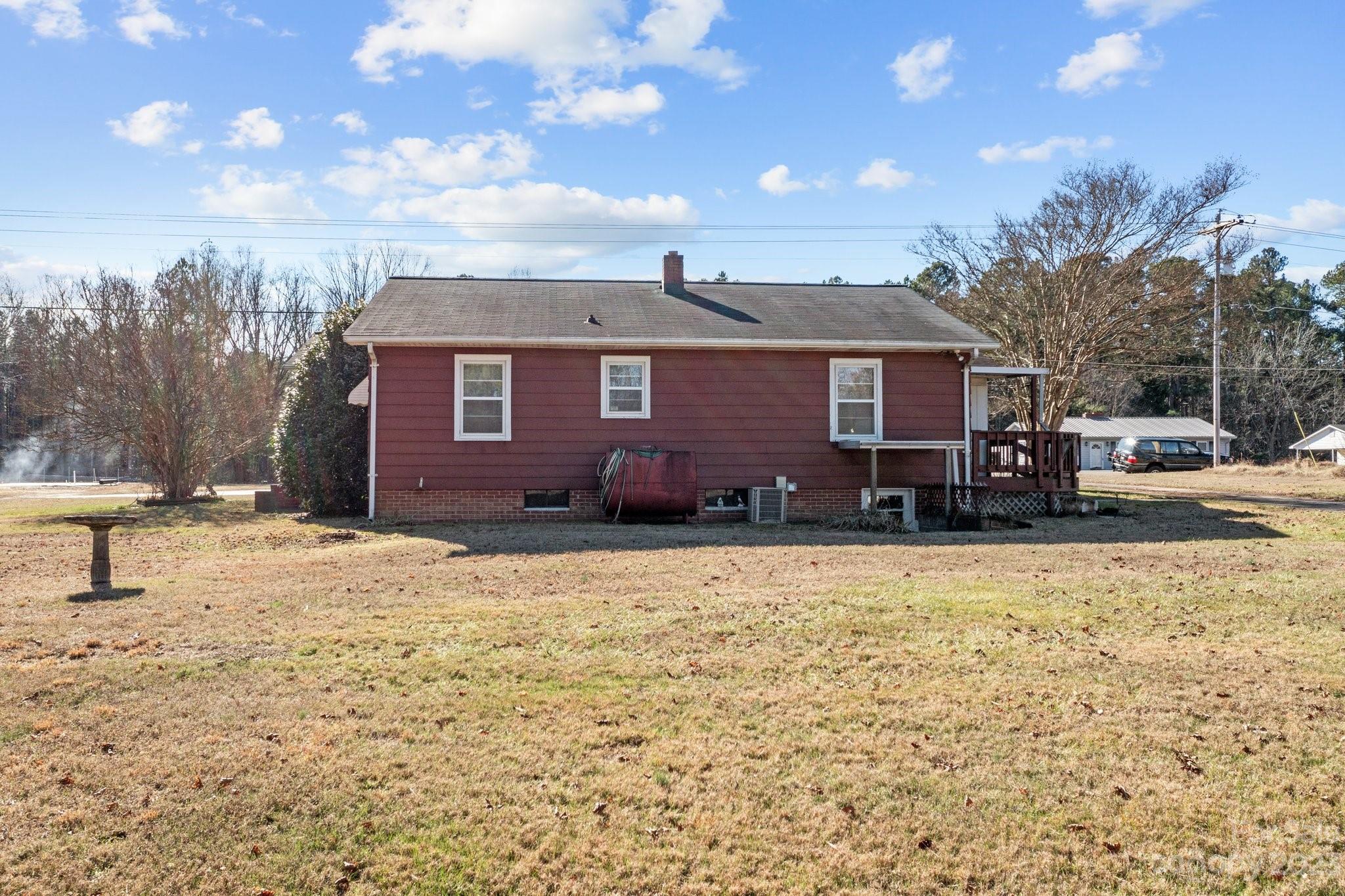 820 Thompson Road Salisbury, NC 28147 - Photo 37 of 48 a backyard of a house with table and chairs