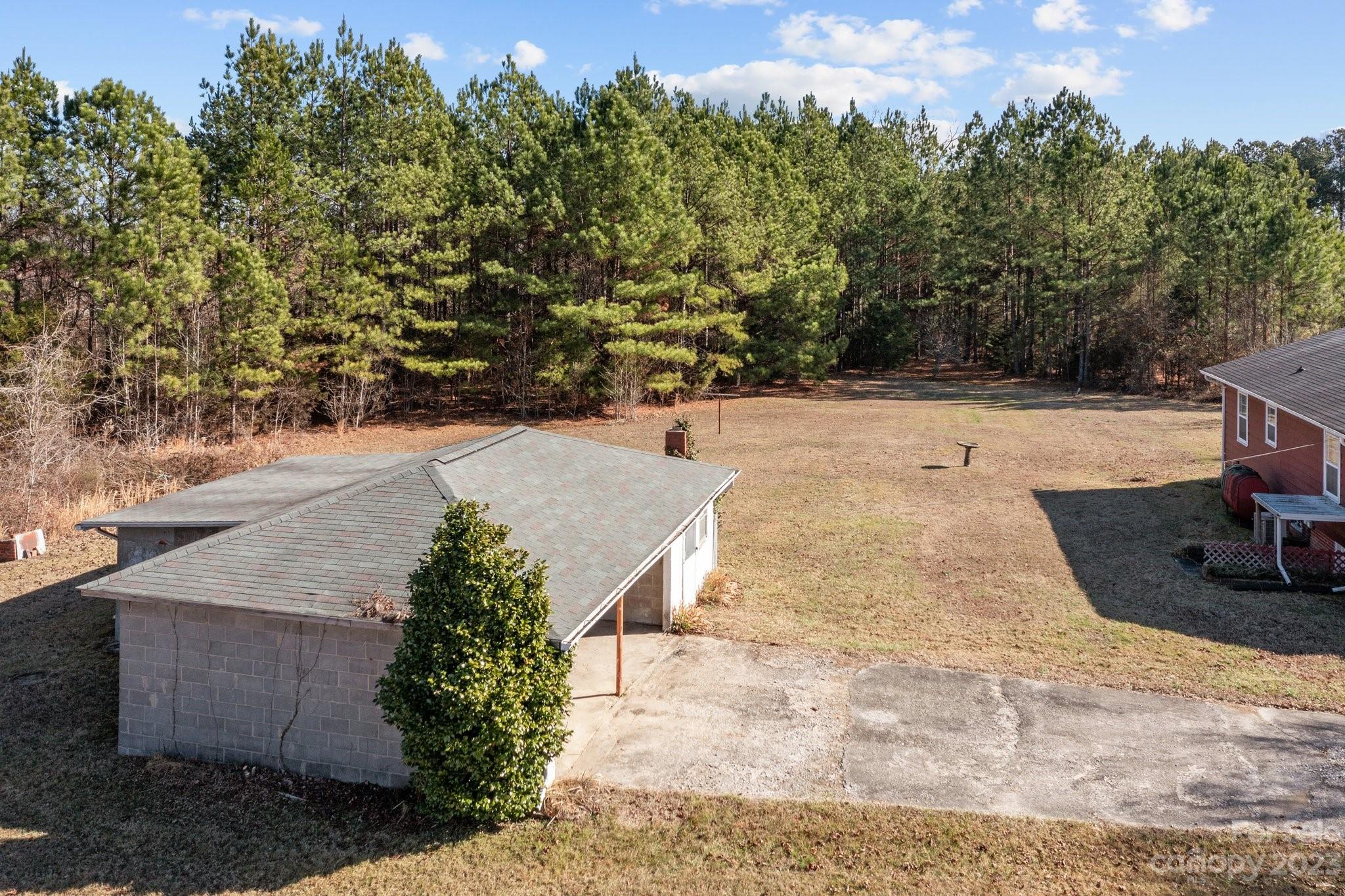 820 Thompson Road Salisbury, NC 28147 - Photo 38 of 48 a view of a yard with an outdoor space