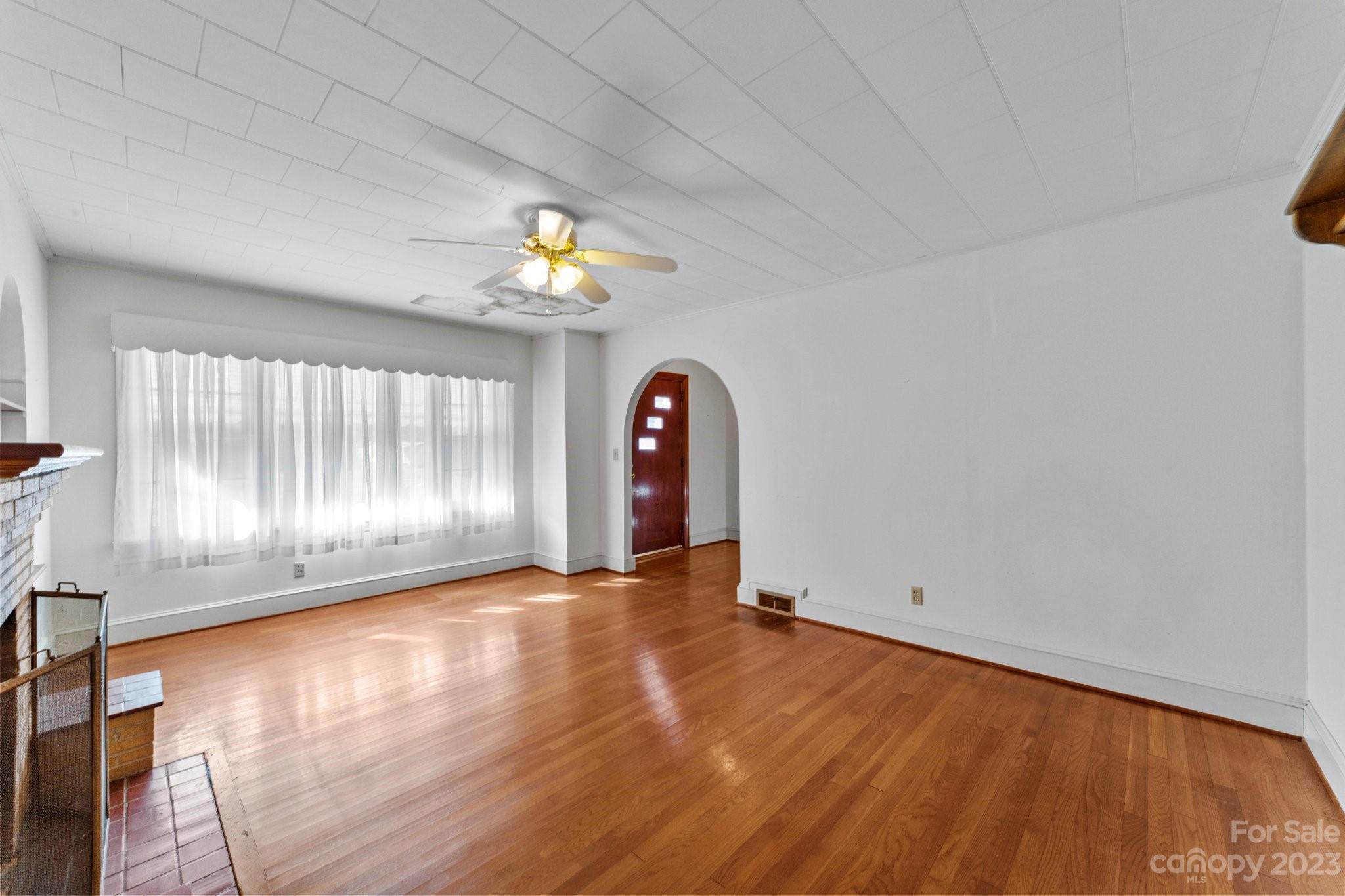 820 Thompson Road Salisbury, NC 28147 - Photo 10 of 48 a view of a room with wooden floor and window