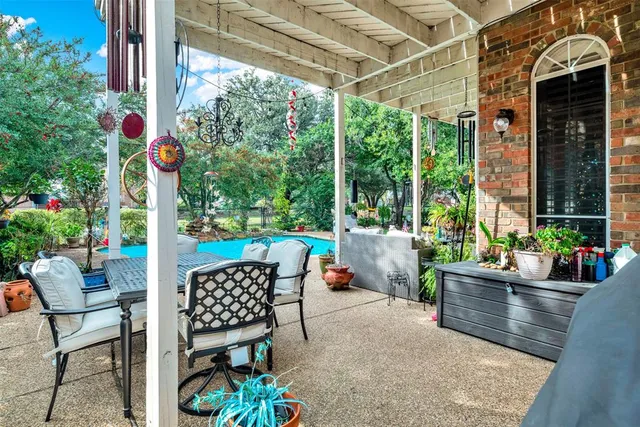 a living room with fireplace furniture and a wooden floor