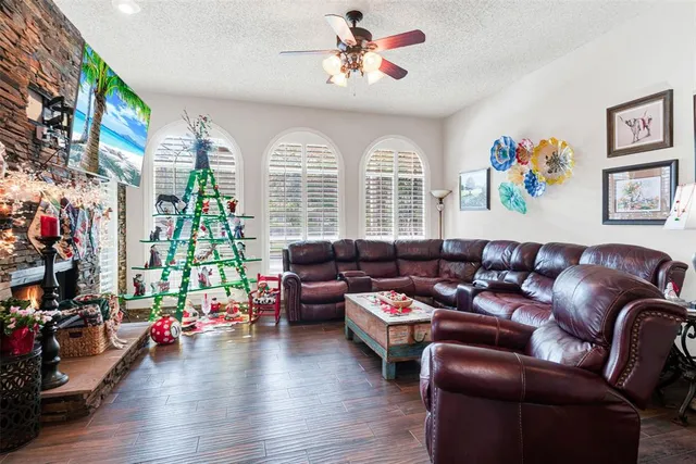 a kitchen with a table chairs stove and cabinets