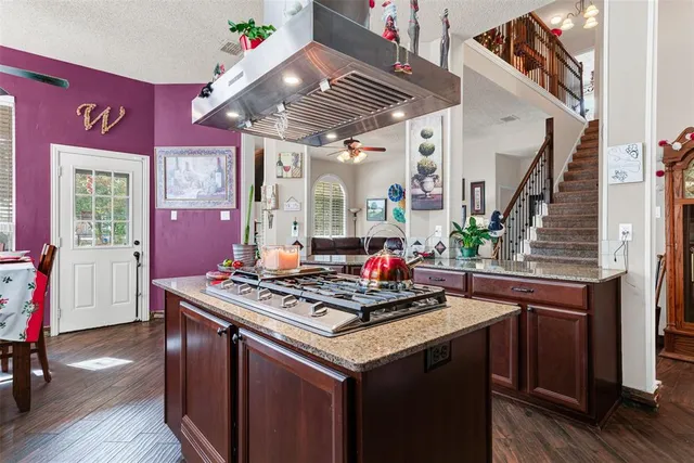 a bedroom with a bed and a flat screen television