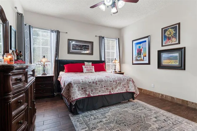 a bathroom with a sink a mirror and shower