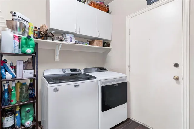 a bathroom with a toilet a sink and a window