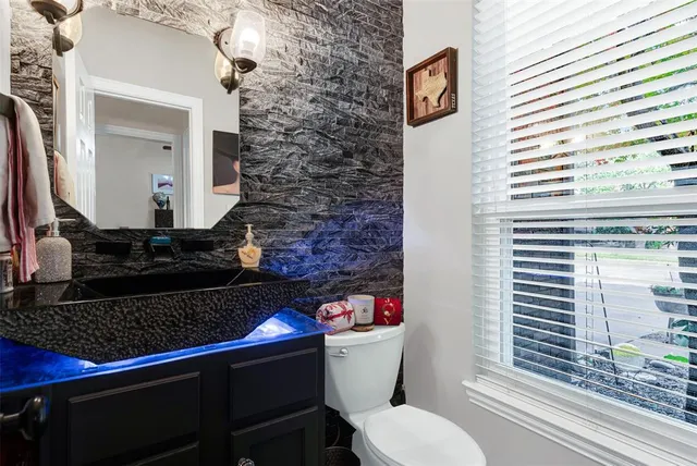 a room with a table and chairs