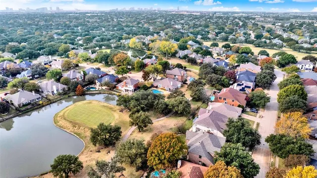 an aerial view of a swimming pool and outdoor space