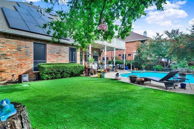 a garden view with a seating space