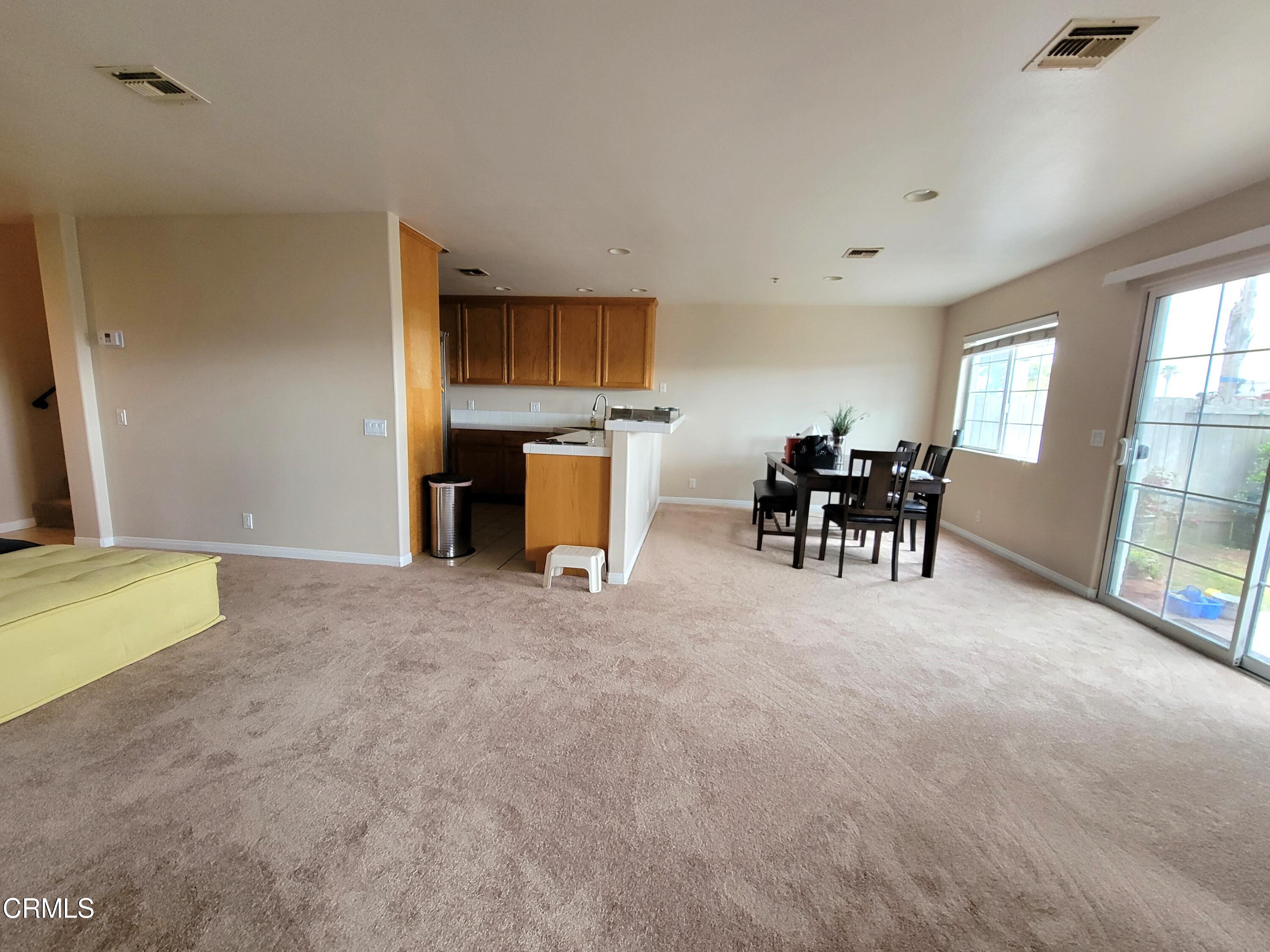 811 Dunes Street Oxnard, CA 93035 - Photo 2 of 10 a view of a livingroom with furniture and a window