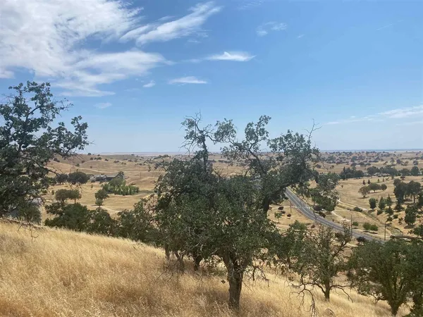 a view of a covered with snow in back