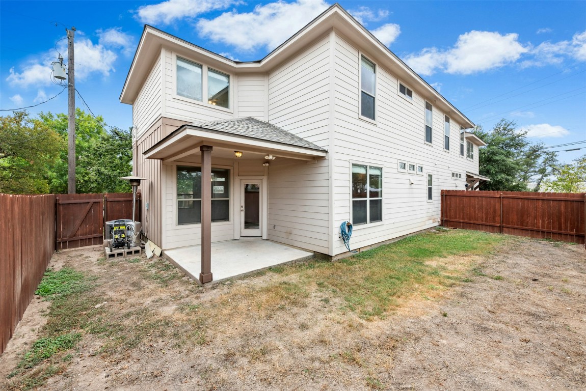 430 Old Fitzhugh Road, Unit 2 Dripping Springs, TX 78620 - Photo 27 of 28 a view of a house with backyard and porch