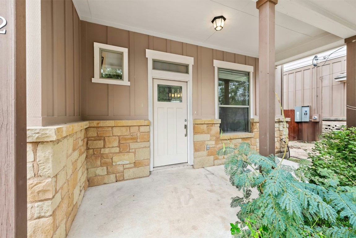 430 Old Fitzhugh Road, Unit 2 Dripping Springs, TX 78620 - Photo 3 of 28 a view of entrance door of the house