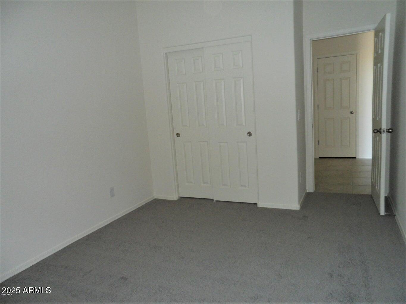 11618 West Boca Raton Road El Mirage, AZ 85335 - Photo 13 of 14 a view of empty room