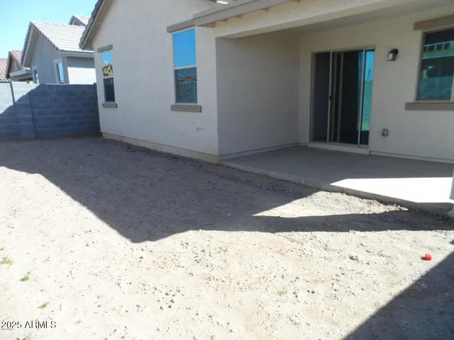a view of wooden floor in front of a house