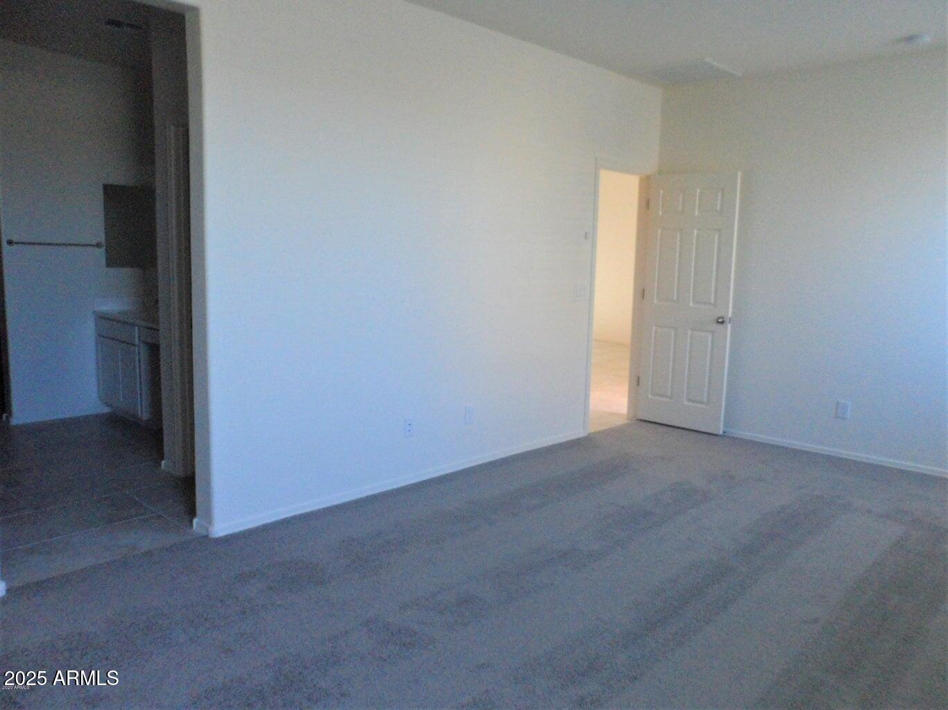 11618 West Boca Raton Road El Mirage, AZ 85335 - Photo 8 of 14 a view of an empty room