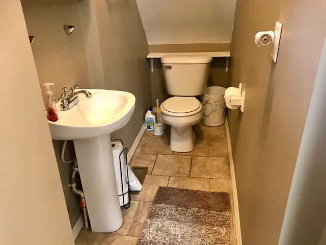 a living room filled with furniture and a couch