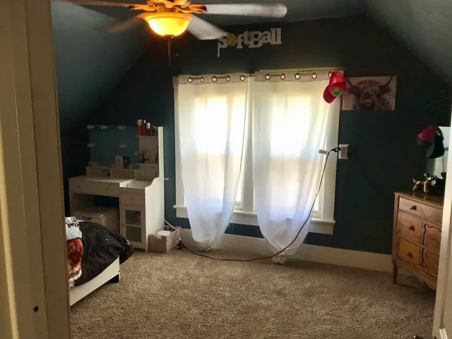 a view of a entryway door with wooden floor