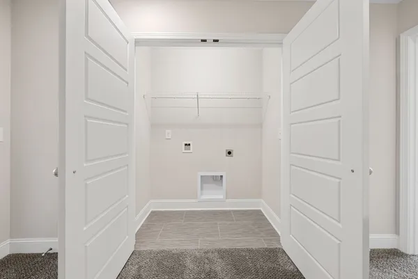 a view of an empty walk in closet