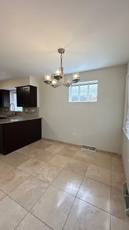 $3,000 | 7532 West Ainslie Street, Harwood Heights, IL 60706
