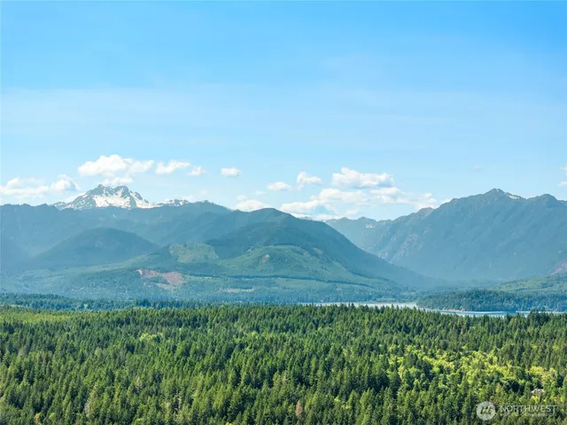 a view of mountain with sunset