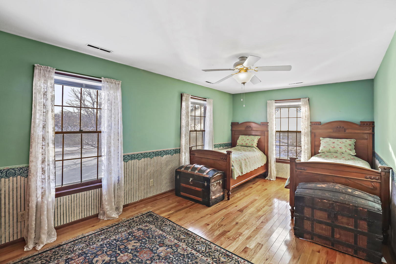 3N118 Howard Road Maple Park, IL 60151 - Photo 18 of 28 a bedroom with a bed and a chandelier