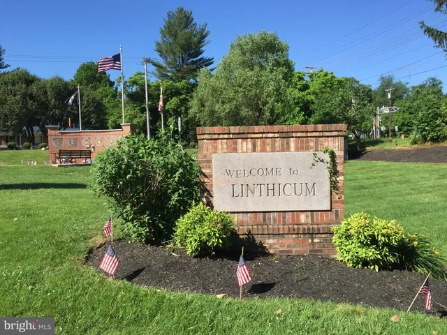 a sign on the side of the road