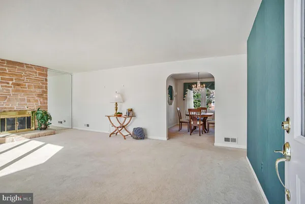 a view of livingroom with furniture and a window