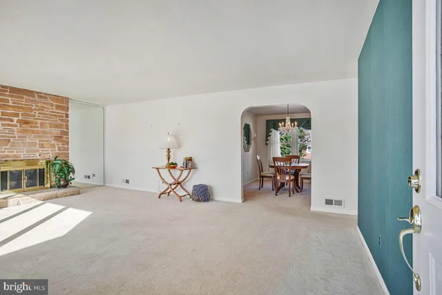 a view of livingroom with furniture and a window