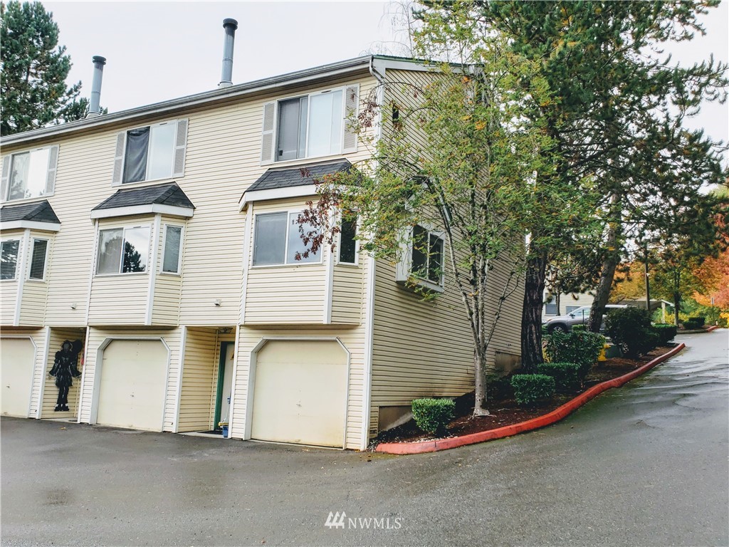 833 Southwest Sunset Boulevard, Unit B7 Renton, WA 98057 - Photo 2 of 33 a view of a house with a street
