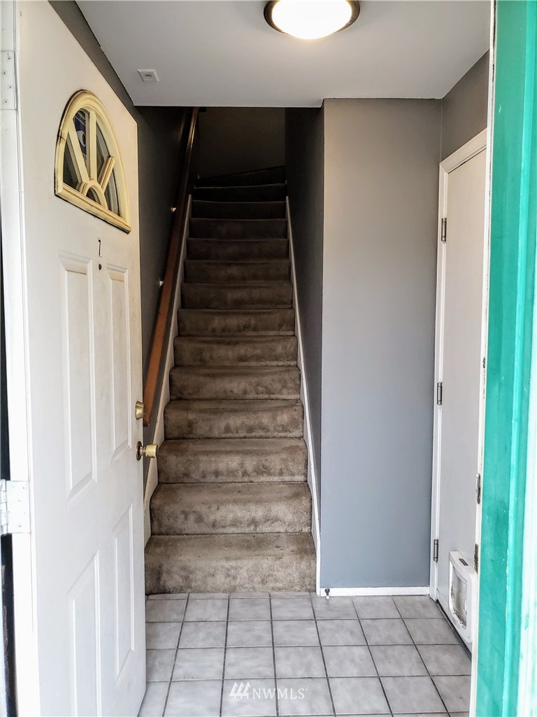 833 Southwest Sunset Boulevard, Unit B7 Renton, WA 98057 - Photo 4 of 33 a view of an entryway with staircase